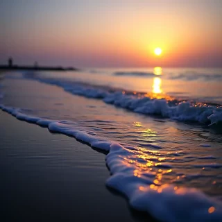 On the shore side, the (LED-lit waves) crash gently against the (translucent water), while in the distance, the (sun) sets gently on the (ocean surface), painting the entire scene in a soft, ethereal light that brings a sense of tranquility and magic